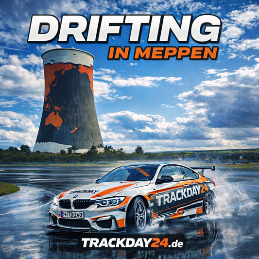 Drifting in Meppen BMW Driftfahrzeug mit Trackday24-Branding beim freien Driften auf dem Circuit Meppen vor dem Kühlturm der Rennstrecke